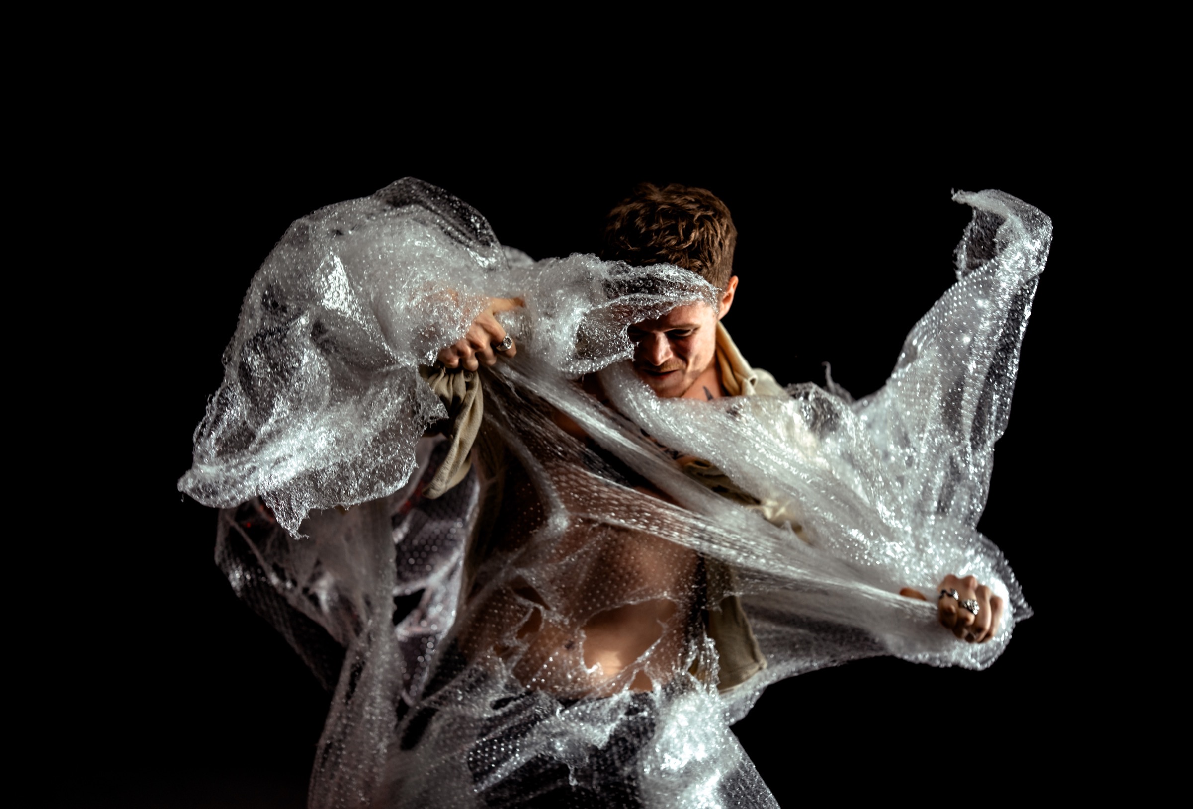 Man wrapped in bubble wrap